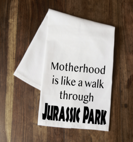 Motherhood is like a walk through Jurassic Park Tea Towel